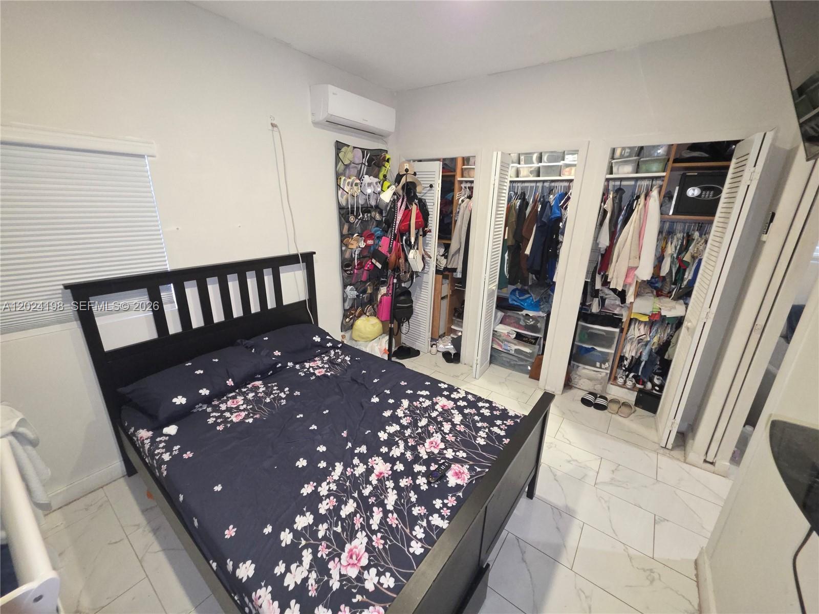 651 East 48th Street Hialeah, FL 33013 - Photo 46 of 52 a view of a hallway with a flower pot and a rug