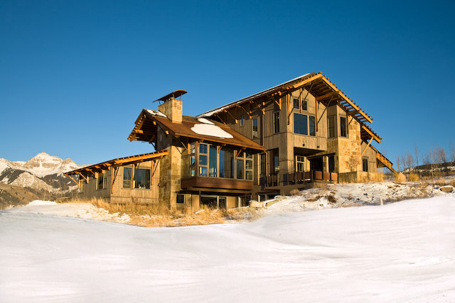 143 Adams Ranch Road Mountain Village, CO 81435 - Photo 1 of 16 a view of a house with snow on the side of it