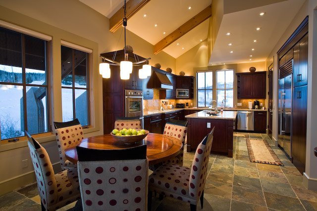143 Adams Ranch Road Mountain Village, CO 81435 - Photo 3 of 16 a living room with stainless steel appliances kitchen island granite countertop a dining table and chairs