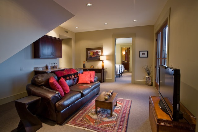 143 Adams Ranch Road Mountain Village, CO 81435 - Photo 7 of 16 a living room with furniture and a flat screen tv