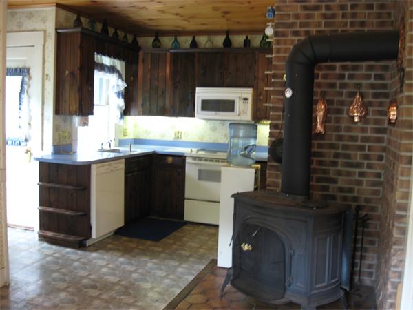 288 Sterling Road Princeton, MA 01541 - Photo 11 of 14 a kitchen with a sink and cabinets