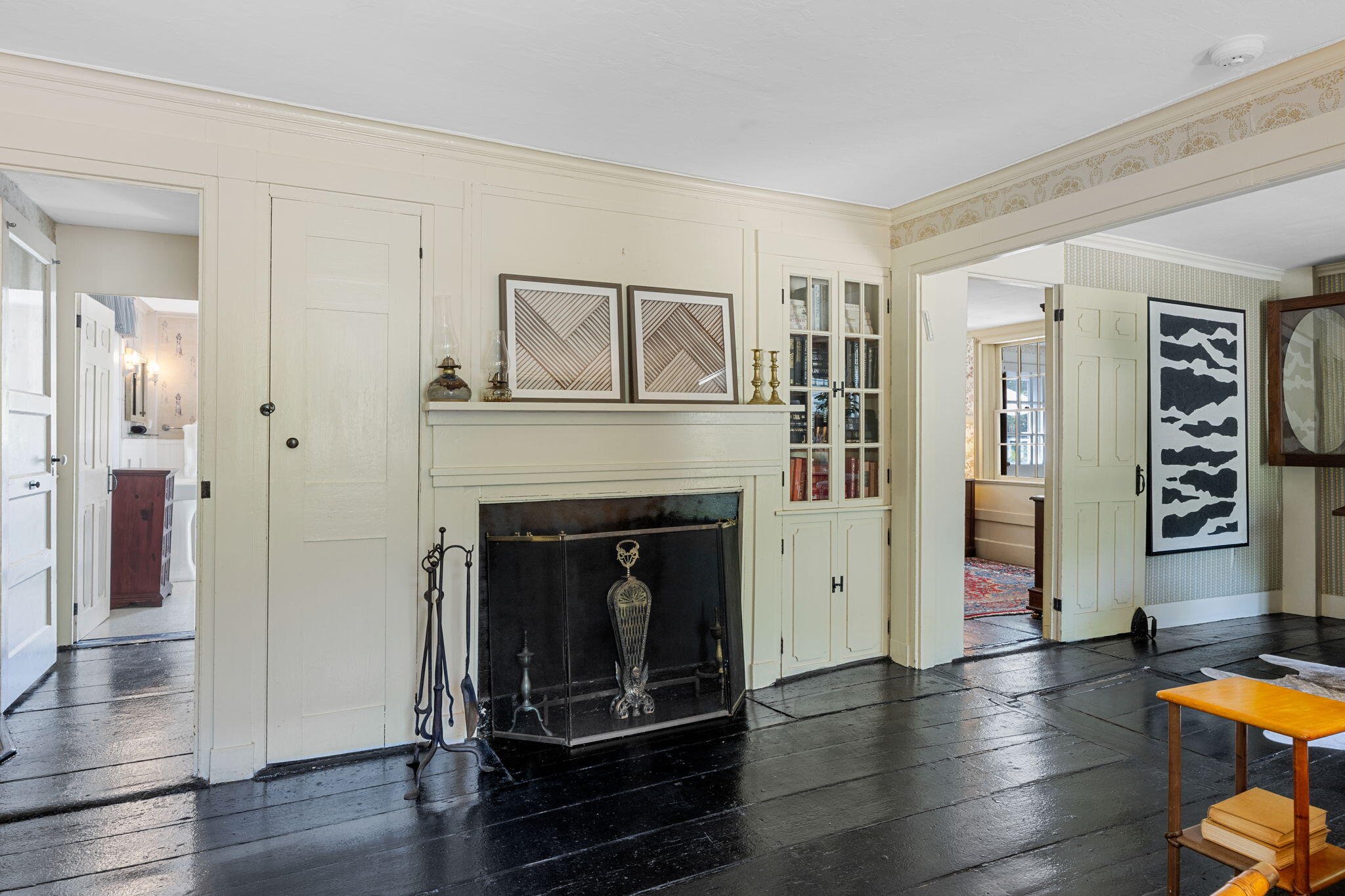 34 Truro Center Road Truro, MA 02666 - Photo 13 of 43 a living room with furniture and a fireplace