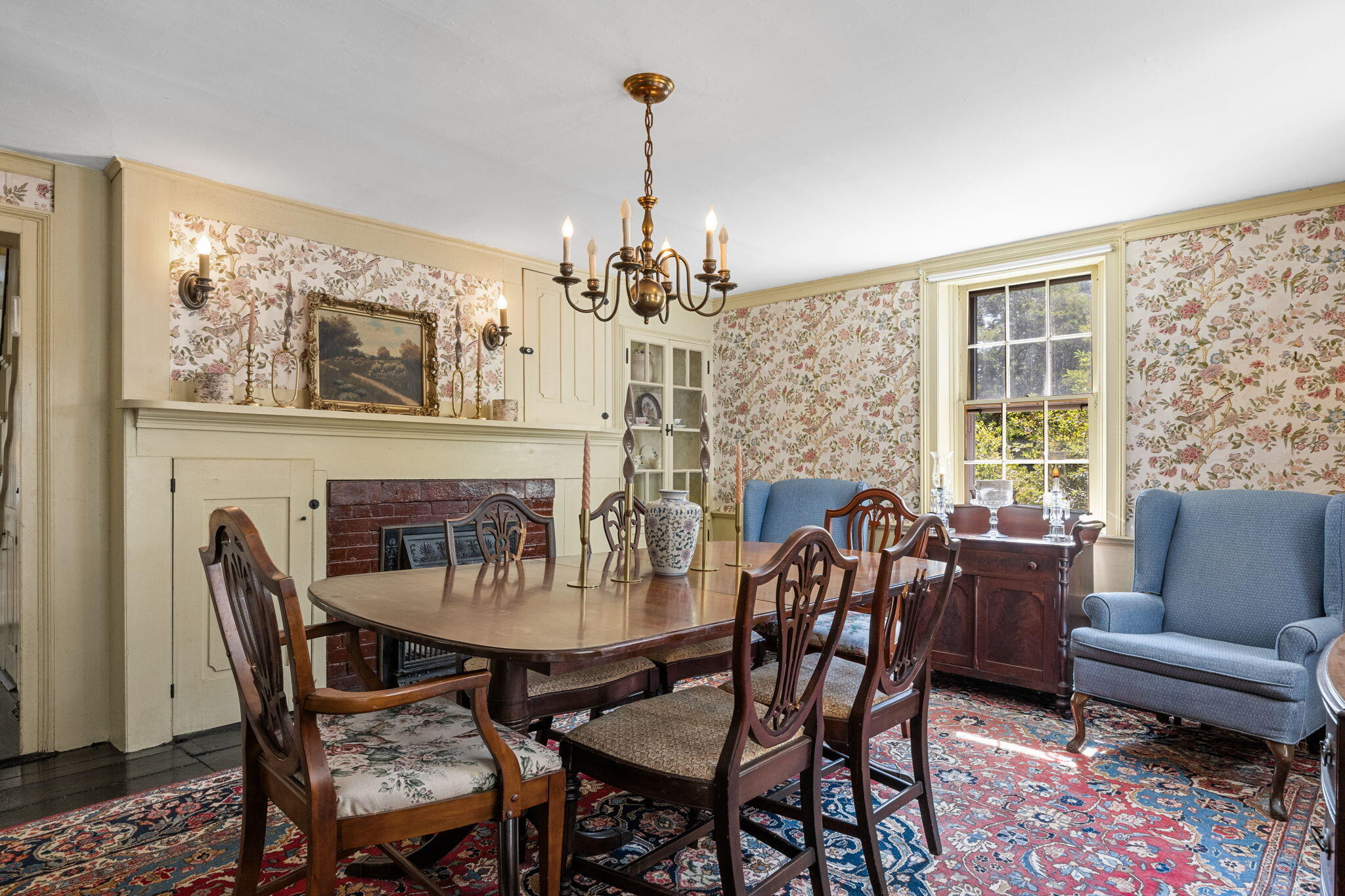 34 Truro Center Road Truro, MA 02666 - Photo 15 of 43 a view of a dining room with furniture wooden floor and a chandelier