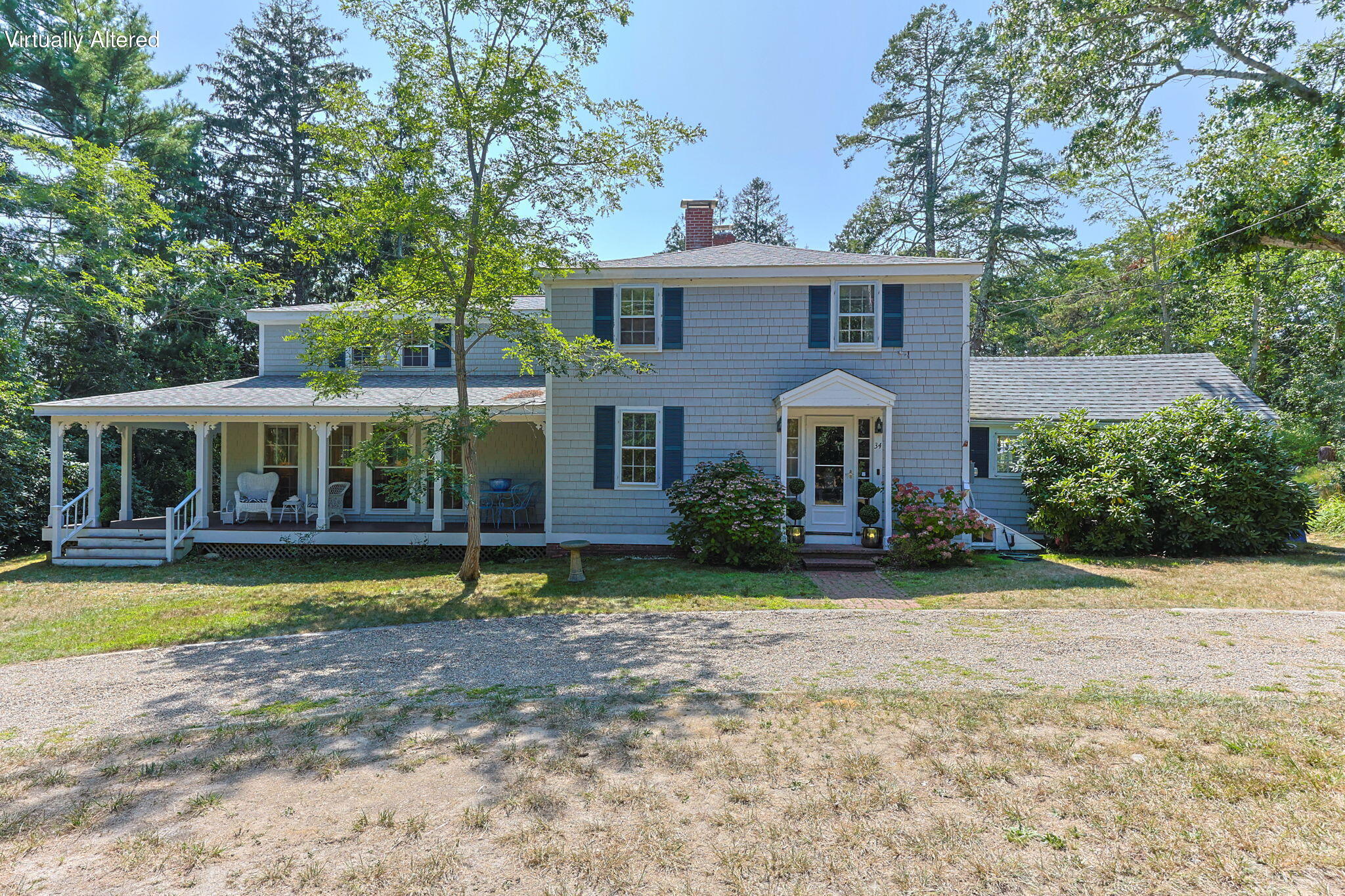 34 Truro Center Road Truro, MA 02666 - Photo 2 of 43 a front view of a house with swimming pool having outdoor seating