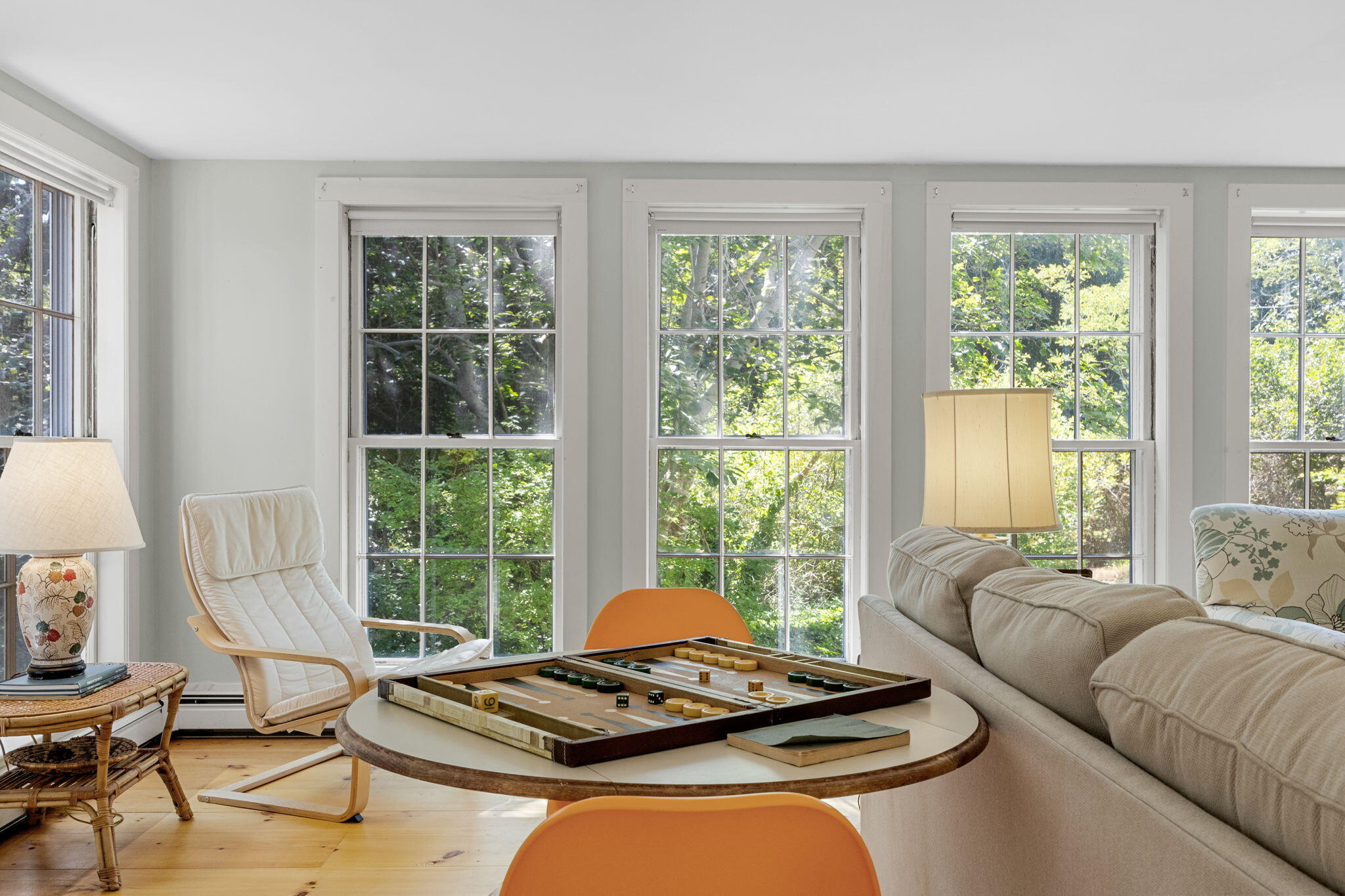 34 Truro Center Road Truro, MA 02666 - Photo 24 of 43 a living room with furniture and floor to ceiling windows