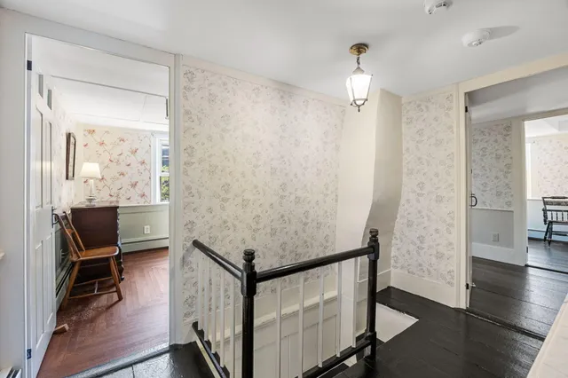 a view of entryway with wooden floor