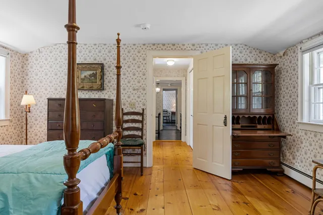 a view of a kitchen from the hallway