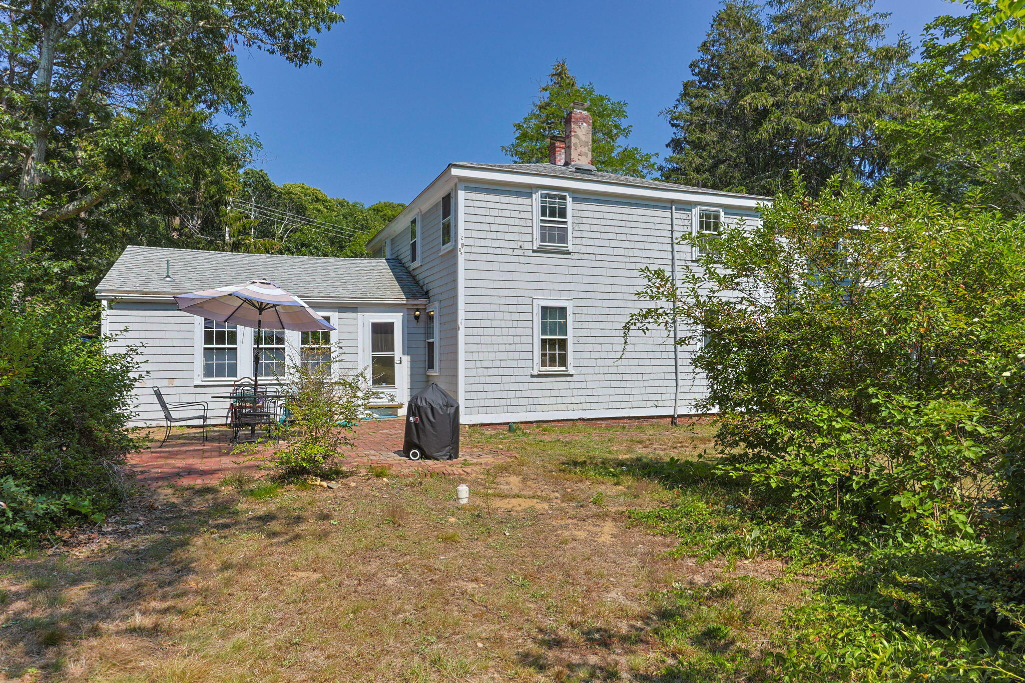 34 Truro Center Road Truro, MA 02666 - Photo 41 of 43 a view of a house with a yard
