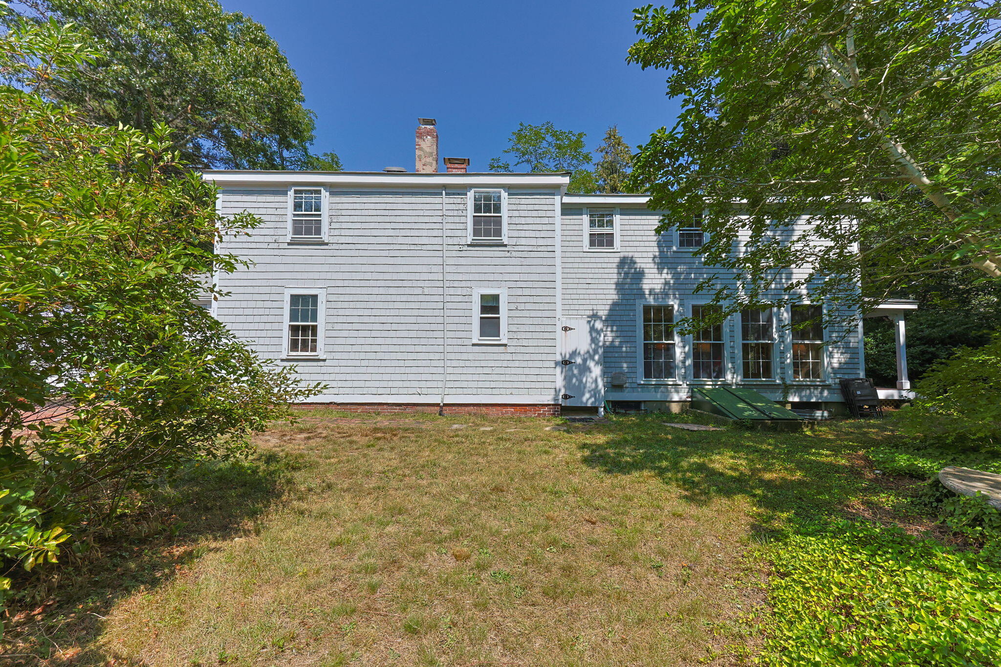 34 Truro Center Road Truro, MA 02666 - Photo 42 of 43 a front view of a house with a garden