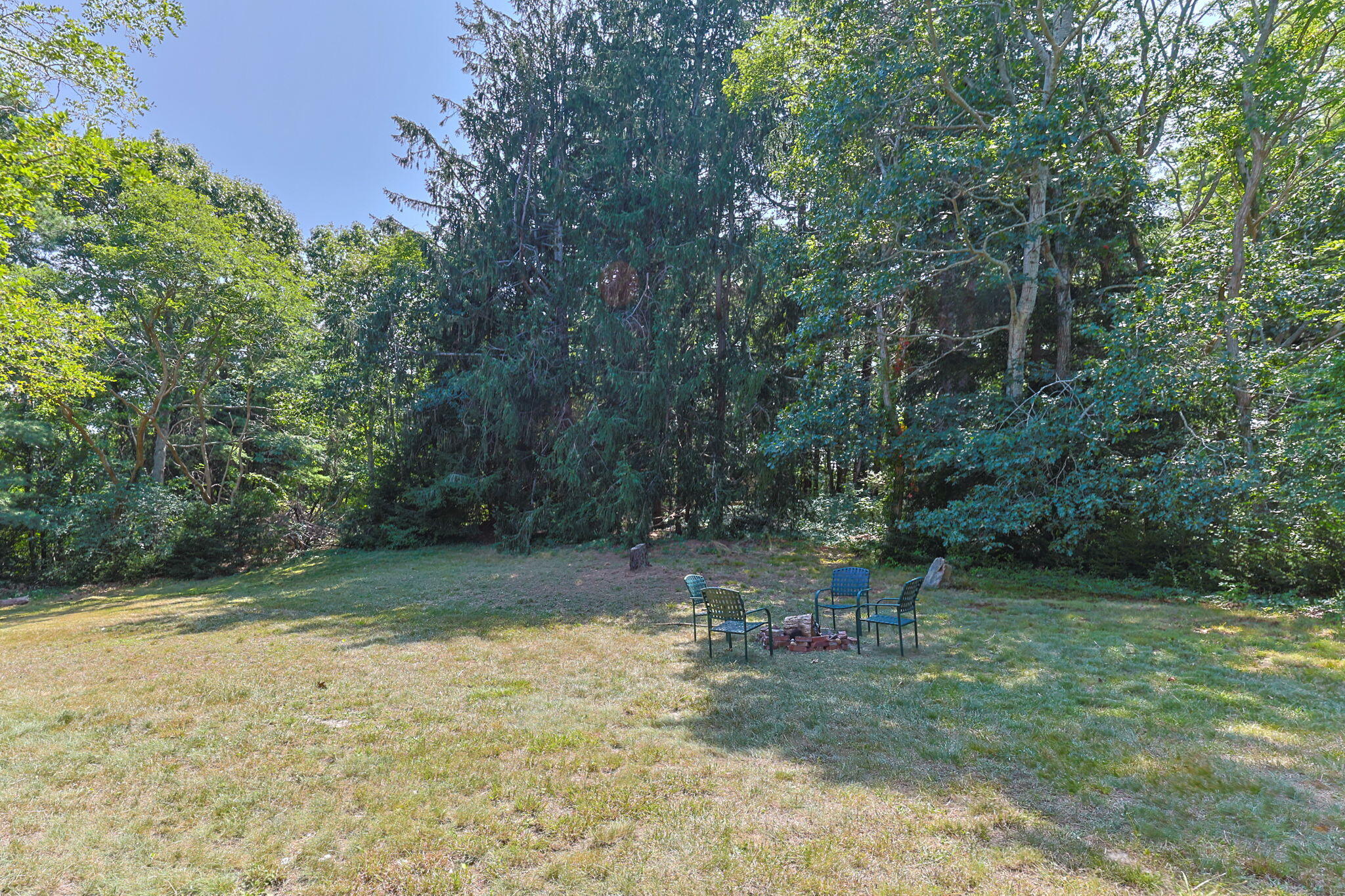 34 Truro Center Road Truro, MA 02666 - Photo 43 of 43 a view of a yard with a tree