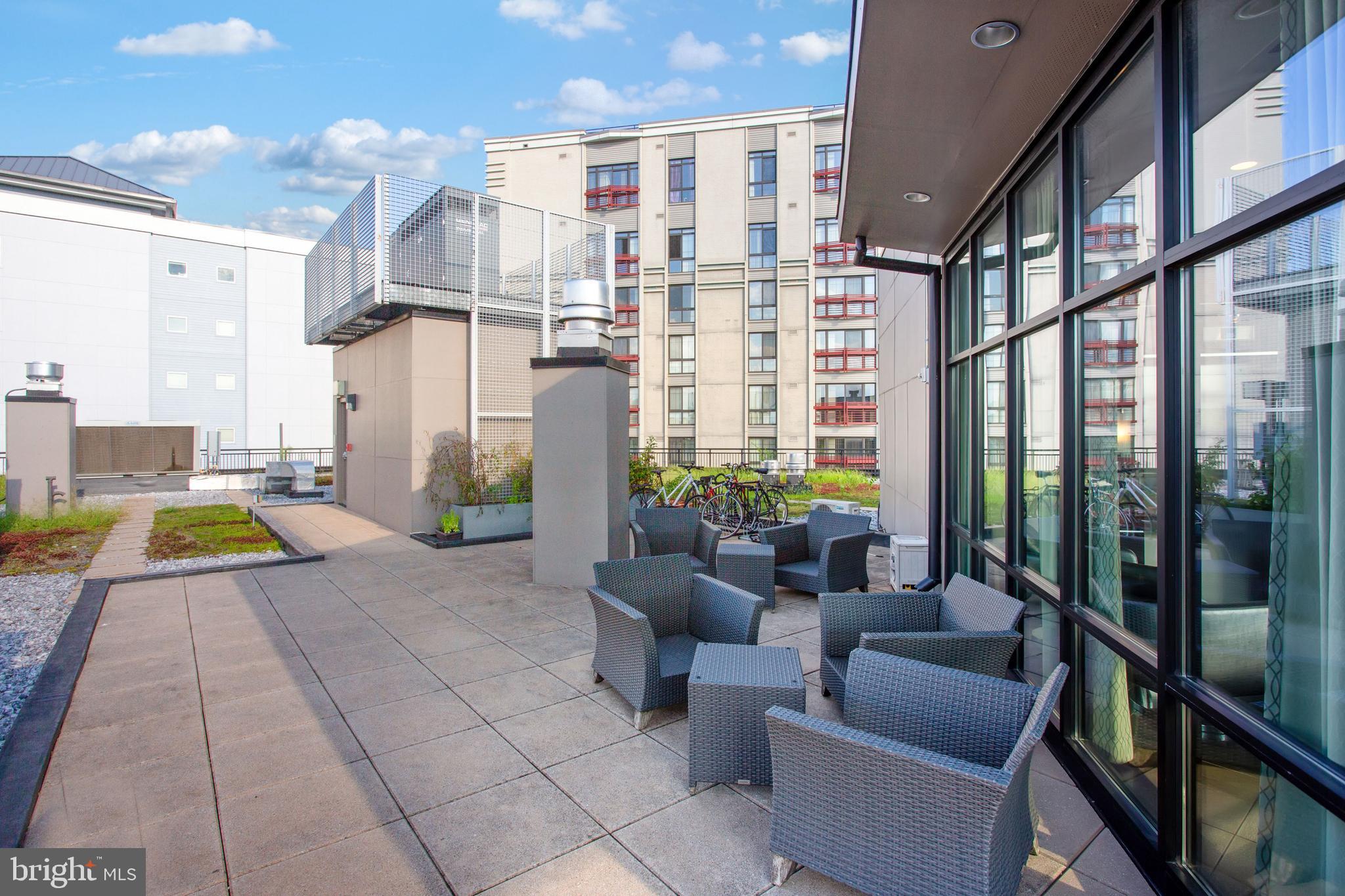 8005 13th Street, Unit 305 Silver Spring, MD 20910 - Photo 36 of 40 a view of tall buildings in the background