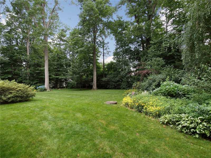 2 Shady Acres Road Darien, CT 06820 - Photo 2 of 18 a view of a garden with a tree