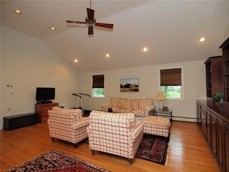 2 Shady Acres Road Darien, CT 06820 - Photo 11 of 18 a living room with furniture and a flat screen tv