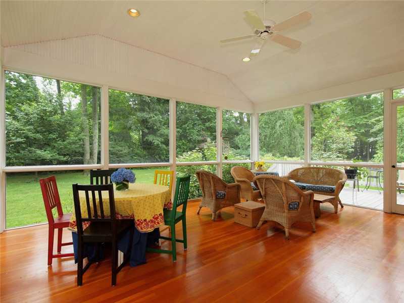2 Shady Acres Road Darien, CT 06820 - Photo 13 of 18 a view of a dining room with furniture window and wooden floor