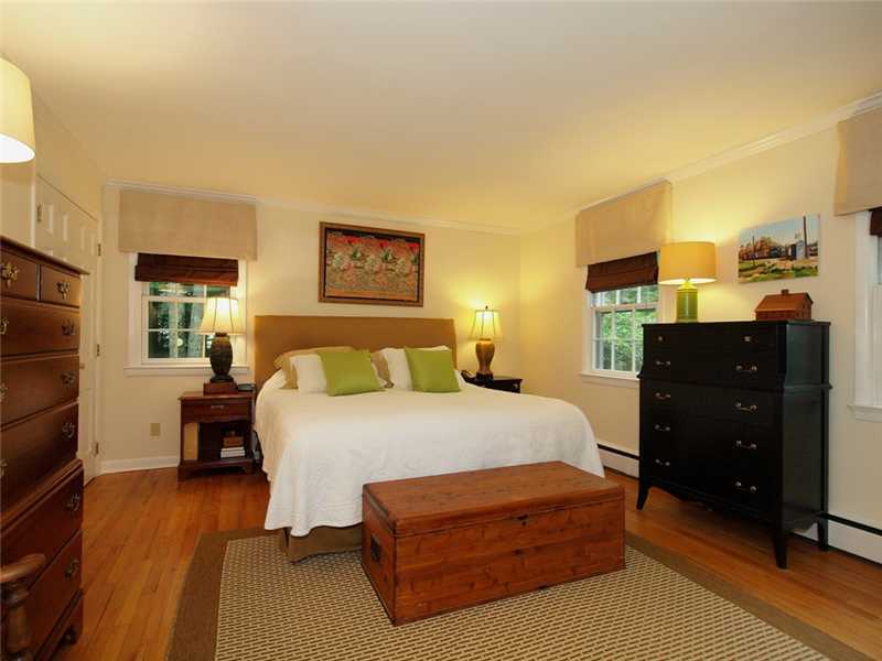 2 Shady Acres Road Darien, CT 06820 - Photo 14 of 18 a bedroom with a bed and dresser