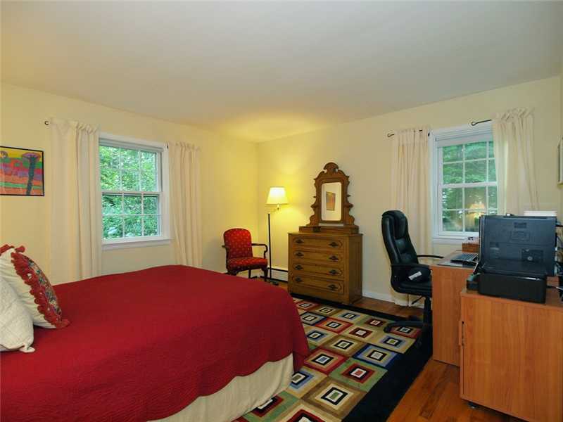 2 Shady Acres Road Darien, CT 06820 - Photo 15 of 18 a bedroom with furniture and a window