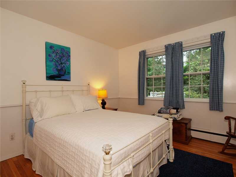 2 Shady Acres Road Darien, CT 06820 - Photo 16 of 18 a bedroom with a bed and a window