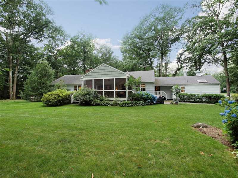 2 Shady Acres Road Darien, CT 06820 - Photo 17 of 18 a front view of a house with a yard