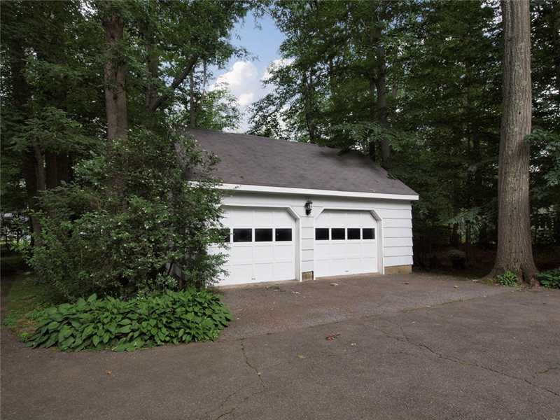 2 Shady Acres Road Darien, CT 06820 - Photo 18 of 18 a house that has a tree in front of it
