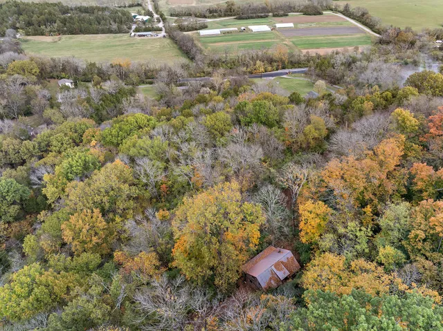 a view of a yard with an outdoor space