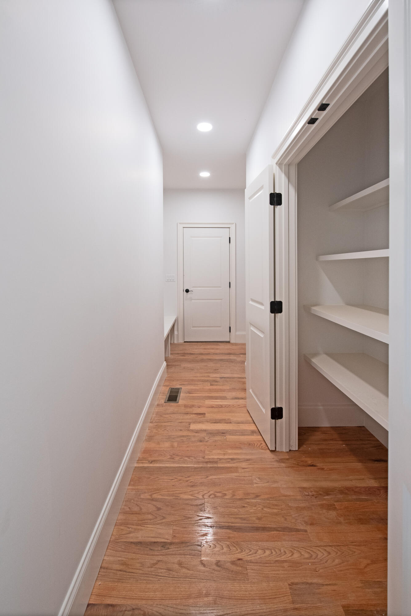 36 Sam Hollow Road Wellfleet, MA 02667 - Photo 20 of 43 a view of an empty room with wooden floor and closet
