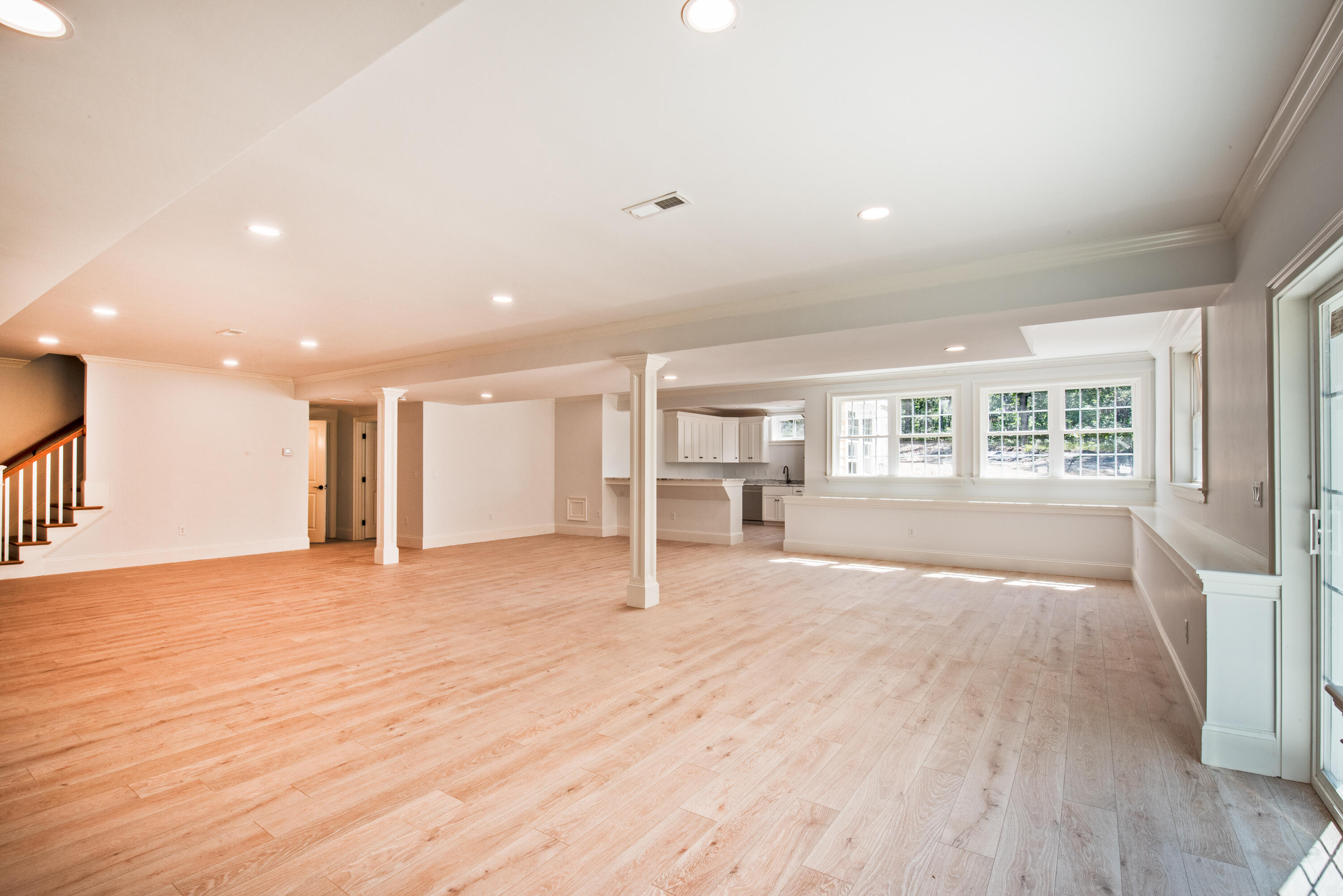 36 Sam Hollow Road Wellfleet, MA 02667 - Photo 23 of 43 a view of an empty room with wooden floor and a window