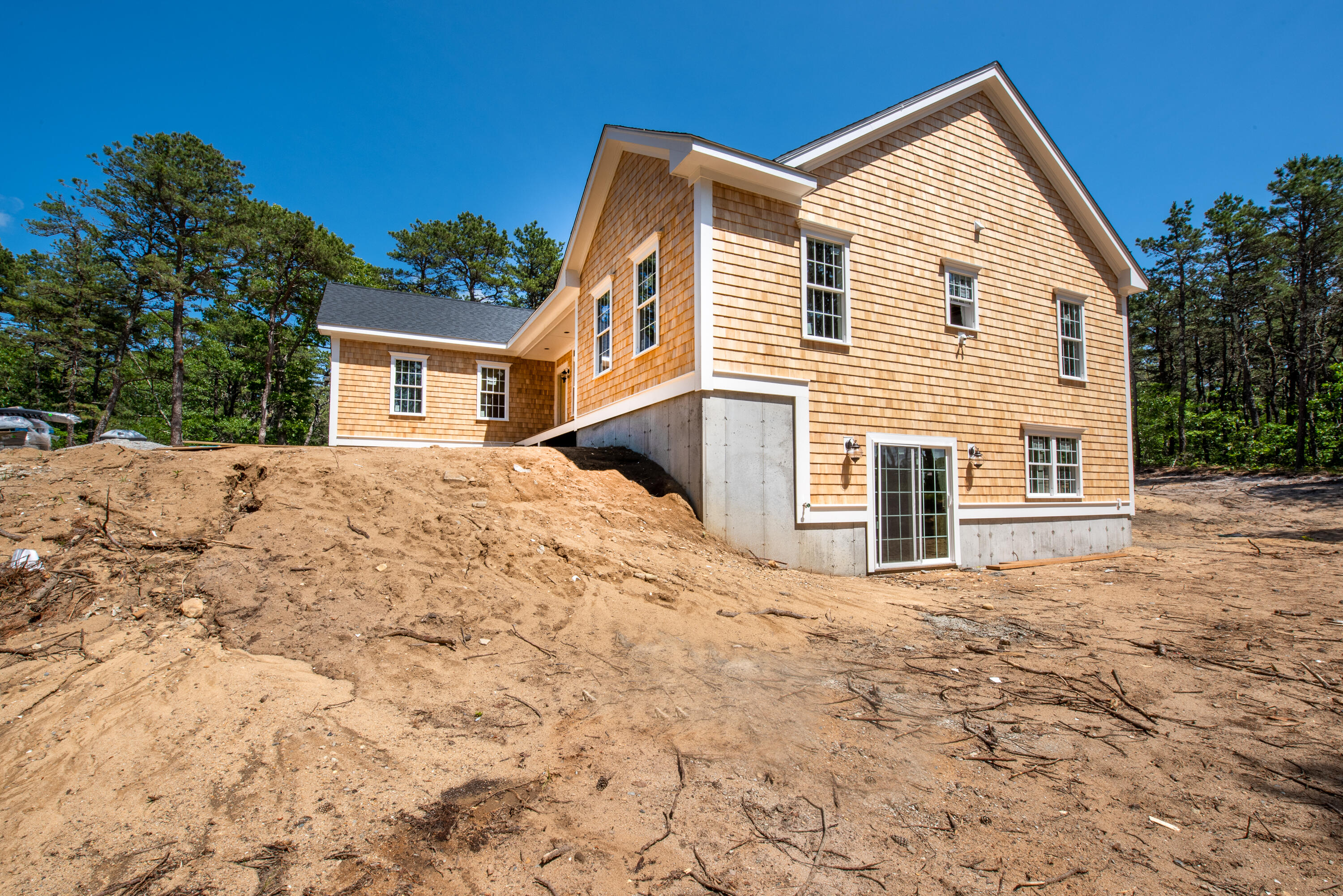 36 Sam Hollow Road Wellfleet, MA 02667 - Photo 35 of 43 a view of a house with a yard