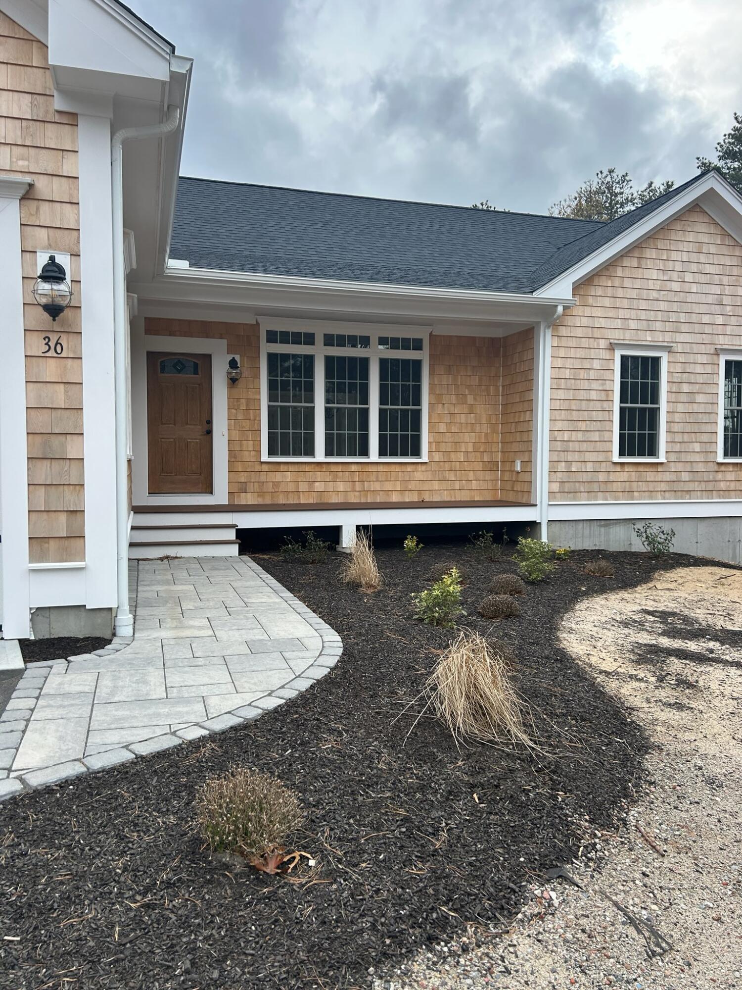36 Sam Hollow Road Wellfleet, MA 02667 - Photo 36 of 43 a view of a house with a yard