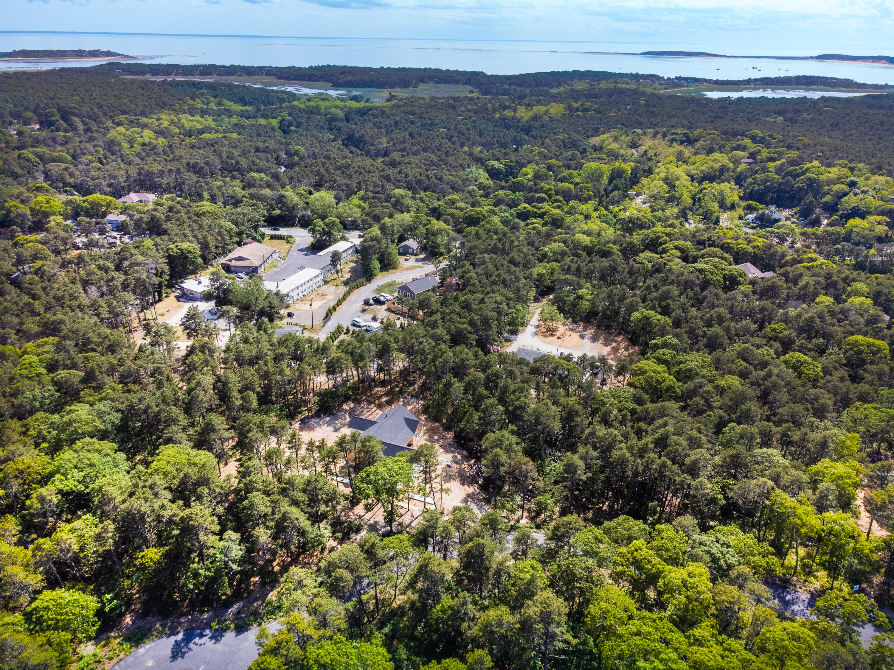 36 Sam Hollow Road Wellfleet, MA 02667 - Photo 40 of 43 a view of a city with green field