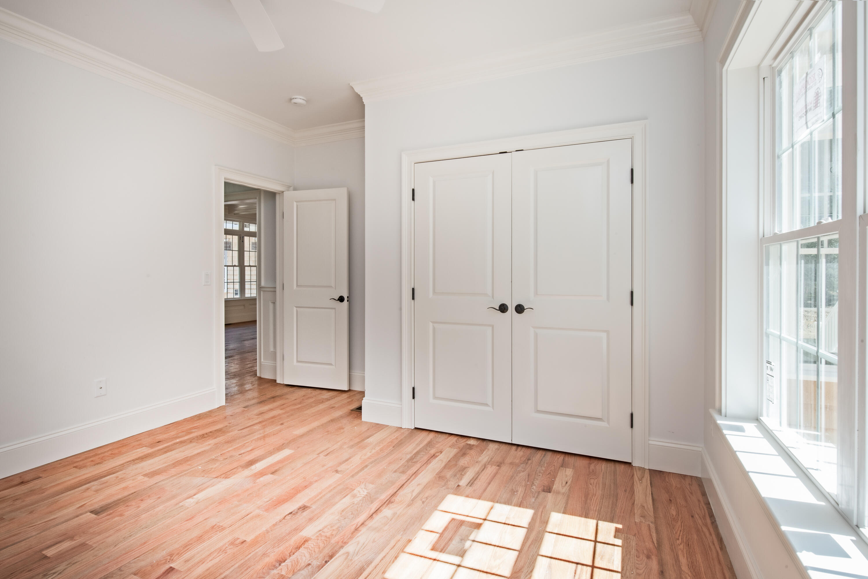 36 Sam Hollow Road Wellfleet, MA 02667 - Photo 10 of 43 a view of empty room with wooden floor and fan