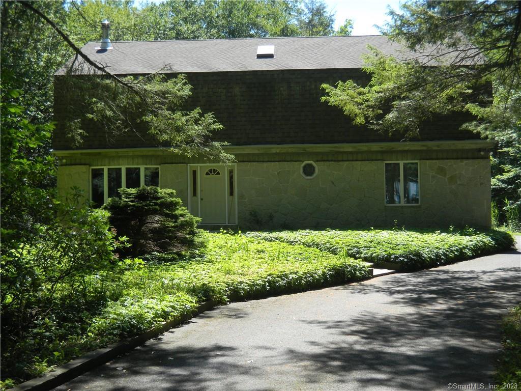 a house view with a garden space