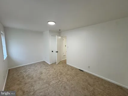 an empty room with an entryway