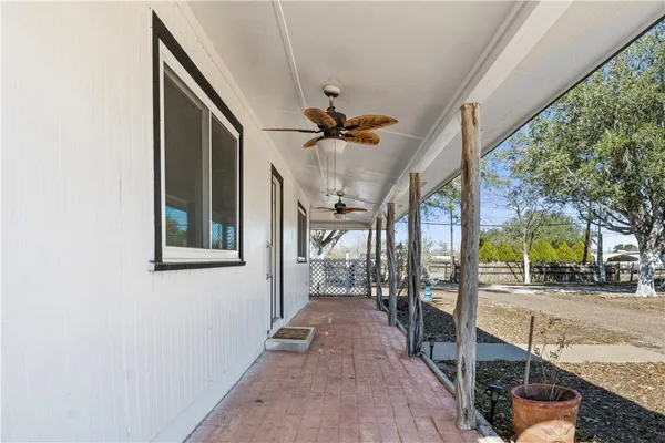 a view of a porch with a backyard
