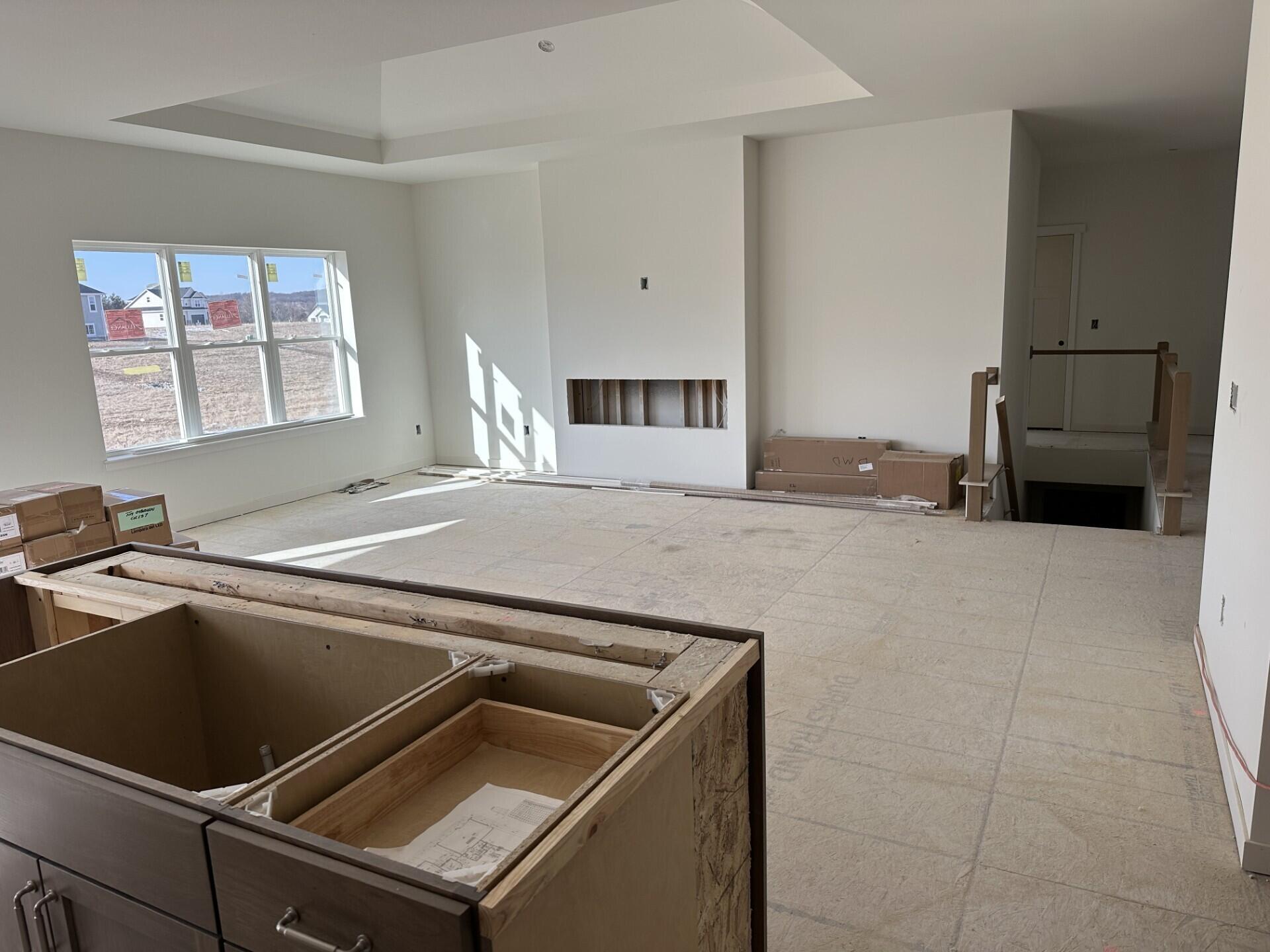 469 Limestone Lane Slinger, WI 53086 - Photo 4 of 8 Bright Great Room w/ Electric Fireplace