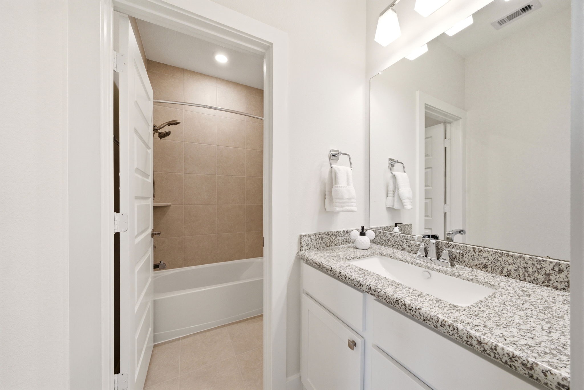 28811 Ember Crest Lane Fulshear, TX 77441 - Photo 31 of 47 a bathroom with a granite countertop sink and a mirror
