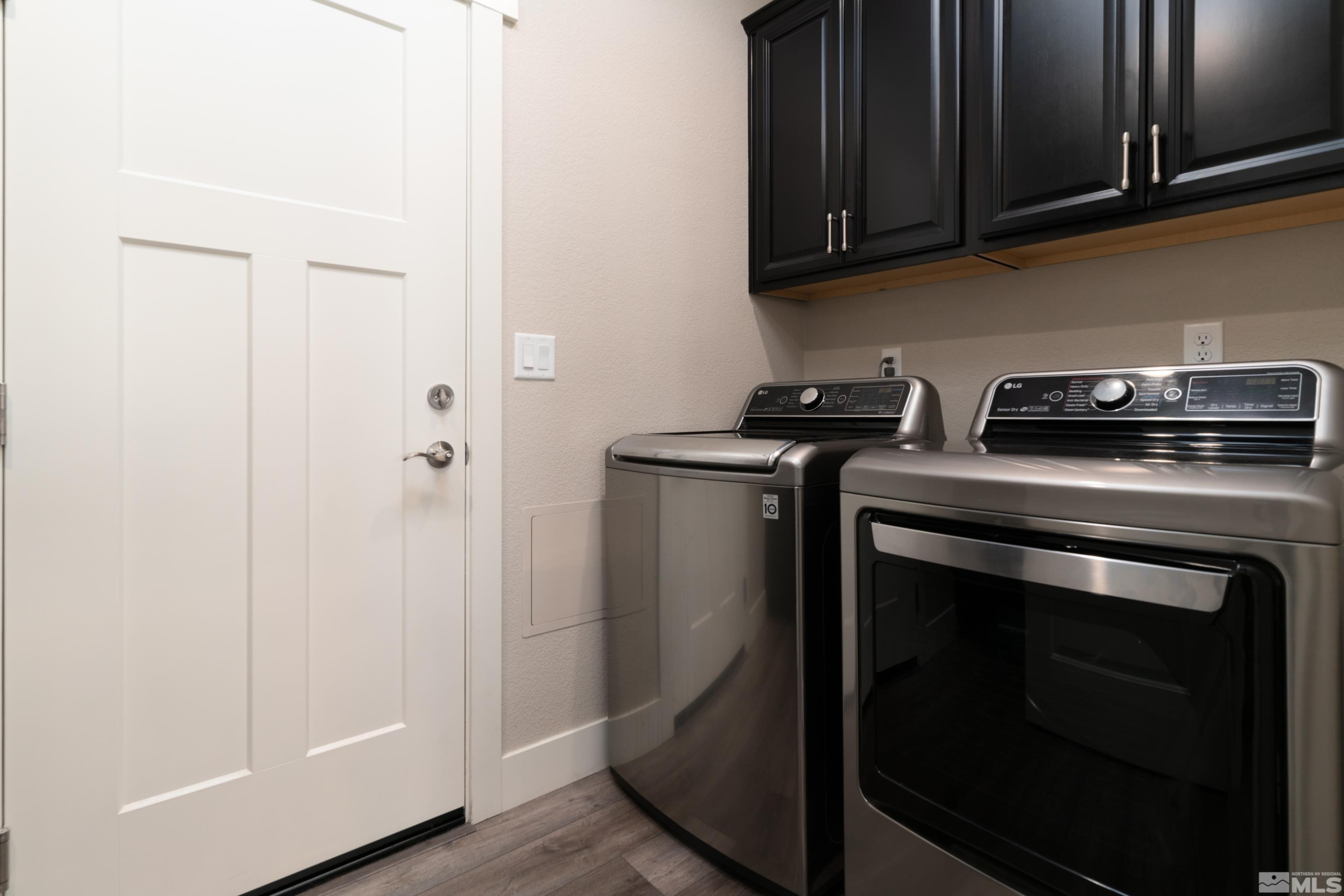 1230 West Cottage Loop Gardnerville, NV 89460 - Photo 19 of 25 a kitchen with a stove and a microwave