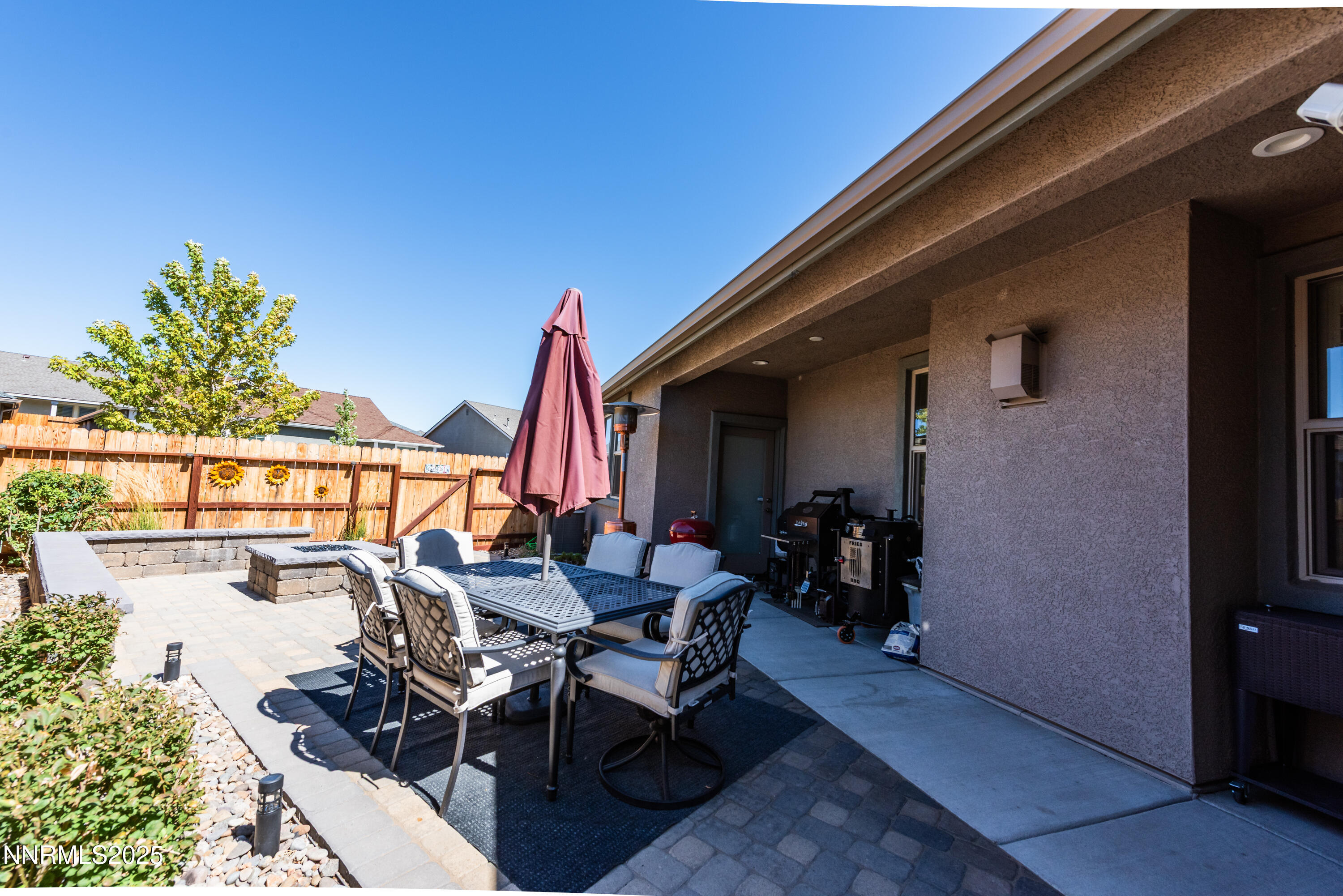 1230 West Cottage Loop Gardnerville, NV 89460 - Photo 21 of 25 a dining room with furniture and a potted plant