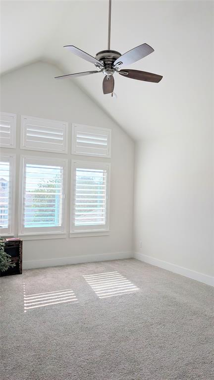 8933 Frostweed Road Frisco, TX 75035 - Photo 24 of 36 a view of a livingroom with a ceiling fan and window