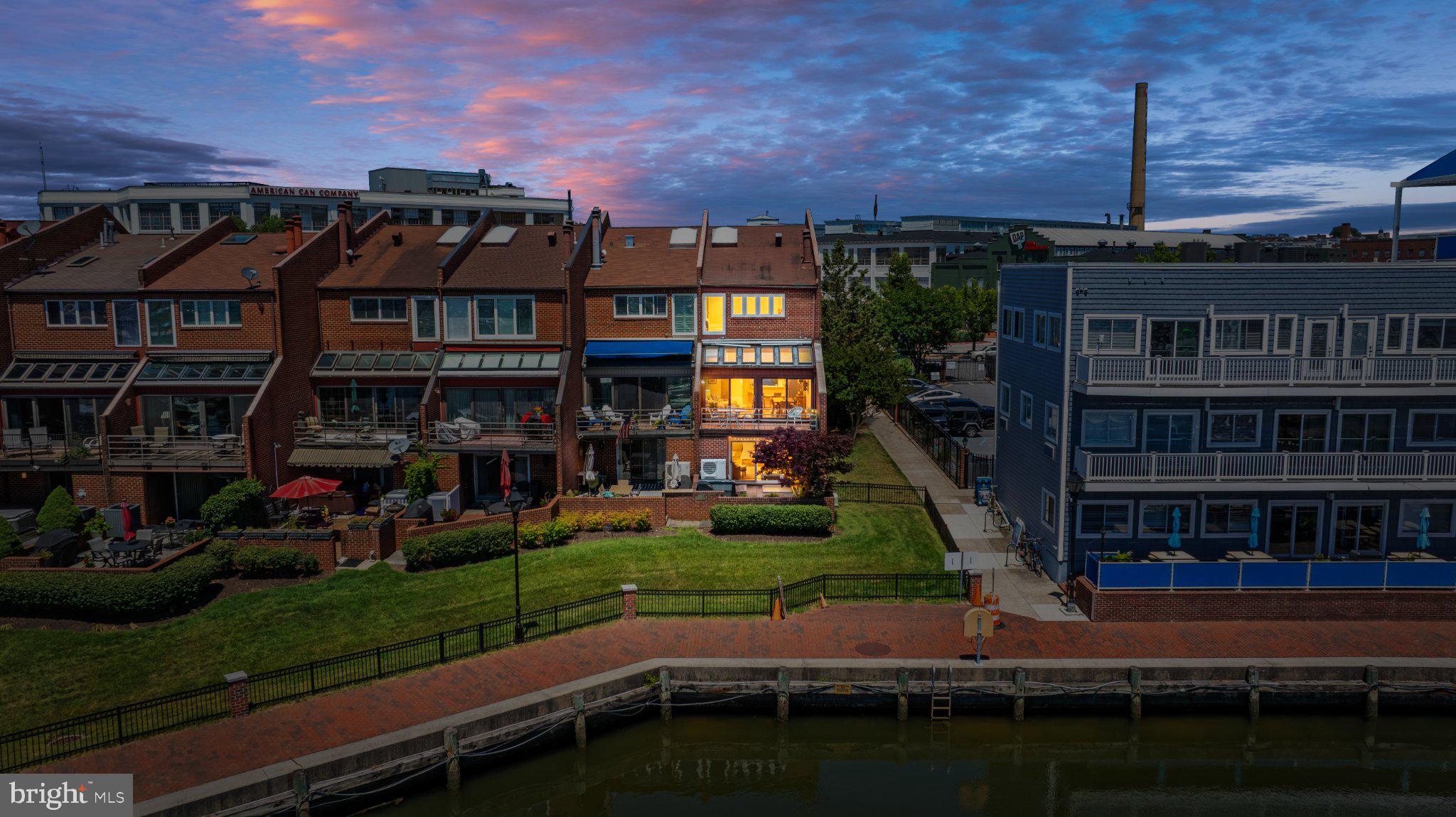 2439 Boston Street Baltimore, MD 21224 - Photo 58 of 78 Charming waterfront homes at dusk.