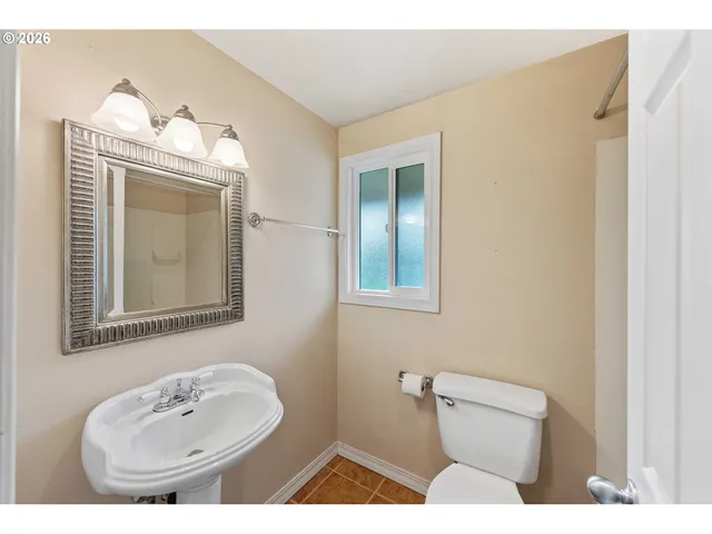 a bathroom with a shower and a bath tub