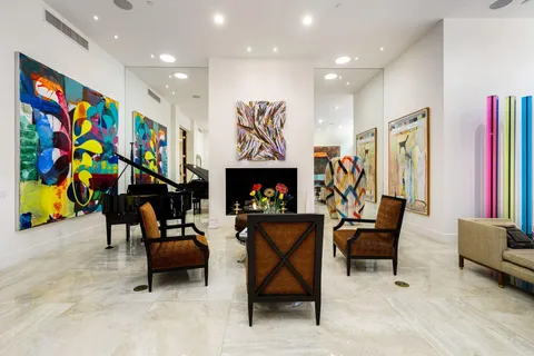 a view of a swimming pool with a yard