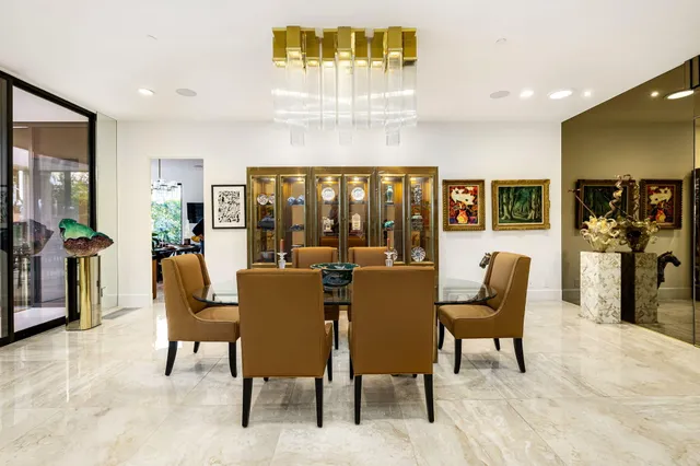 a view of a house with swimming pool and porch with furniture