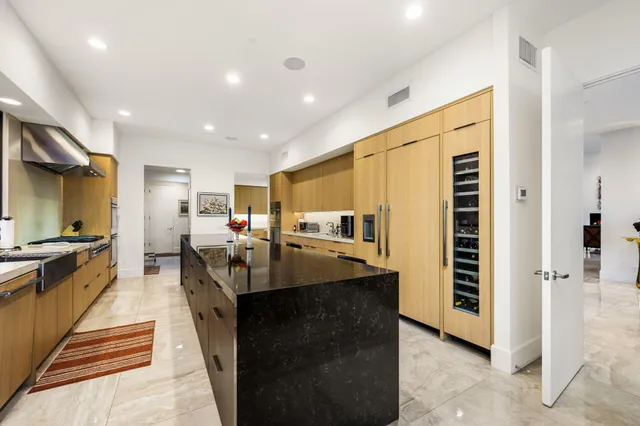 a swimming pool with outdoor seating and yard