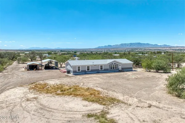 a view of the ocean with beach