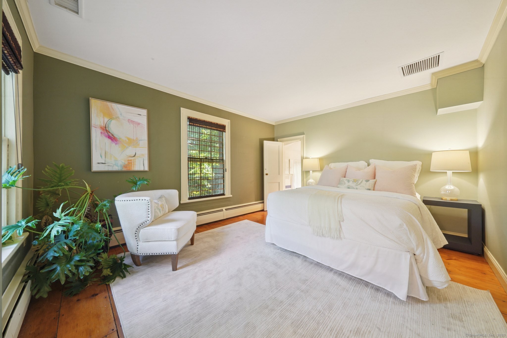 342 Greens Farms Road Westport, CT 06880 - Photo 13 of 31 a bedroom with a large bed and a couch