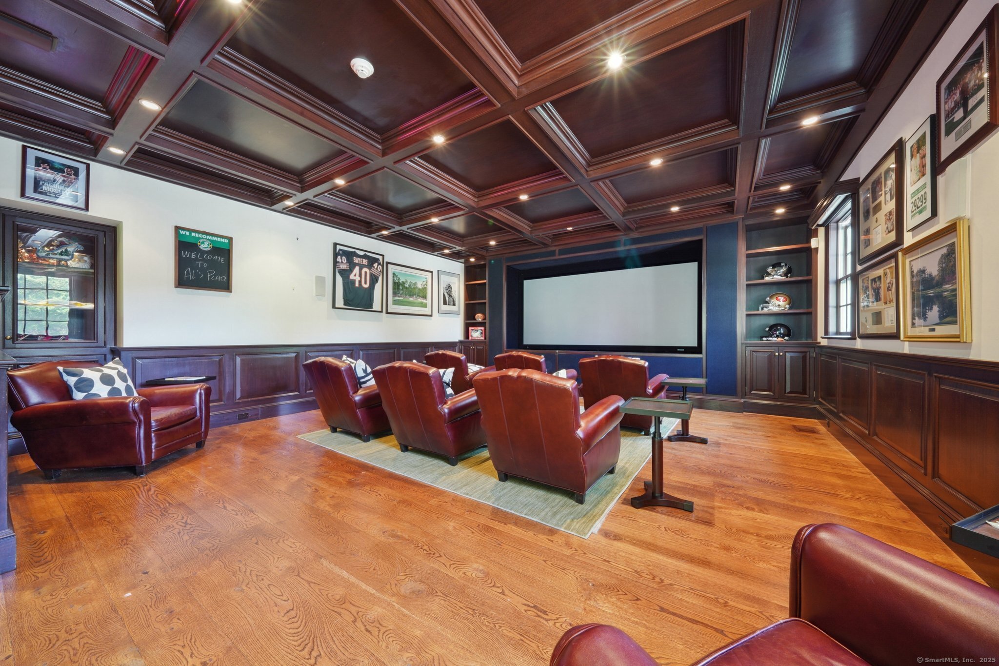342 Greens Farms Road Westport, CT 06880 - Photo 24 of 31 a living room with furniture ceiling fan and a projector