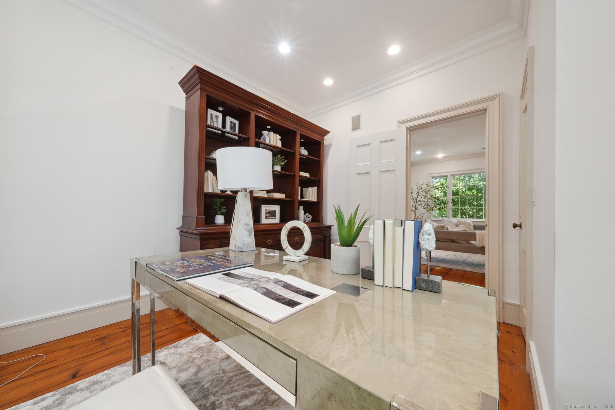 342 Greens Farms Road Westport, CT 06880 - Photo 8 of 31 a living room with furniture and a table