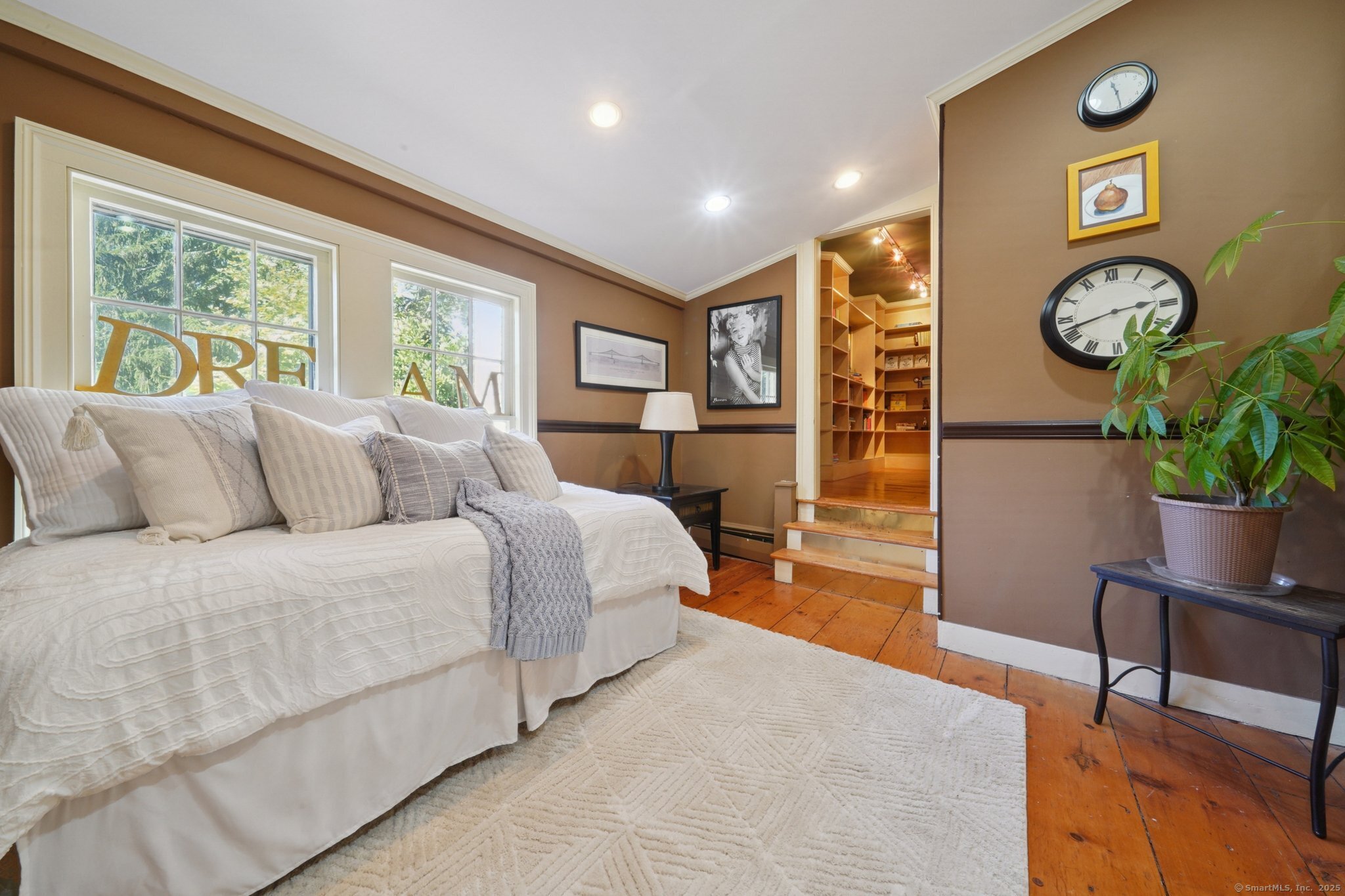 342 Greens Farms Road Westport, CT 06880 - Photo 9 of 31 a living room with a bed furniture and a window