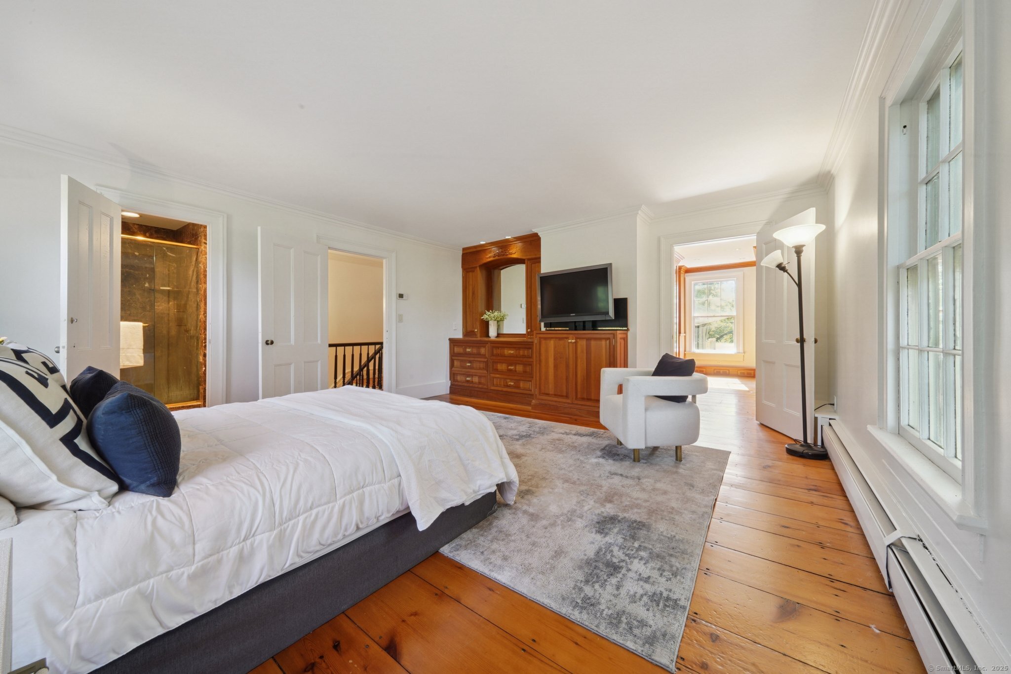 342 Greens Farms Road Westport, CT 06880 - Photo 10 of 31 a bedroom with a bed and a couch