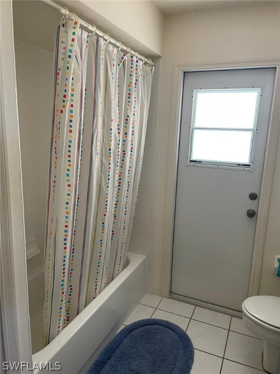 690 Morning Mist Lane Lehigh Acres, FL 33974 - Photo 17 of 20 a view of an empty room with a window